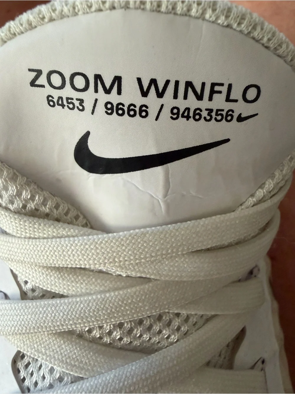Nike Women’s White Athletic Sneakers with Leopard-Print Swoosh